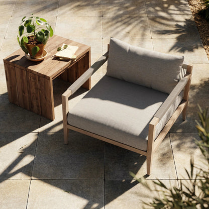 Sherwood Outdoor Chair, Washed Brown by Four Hands. Made from 100% olefin, solid fsc®-certified teak, 100% polypropylene in a coastal style.