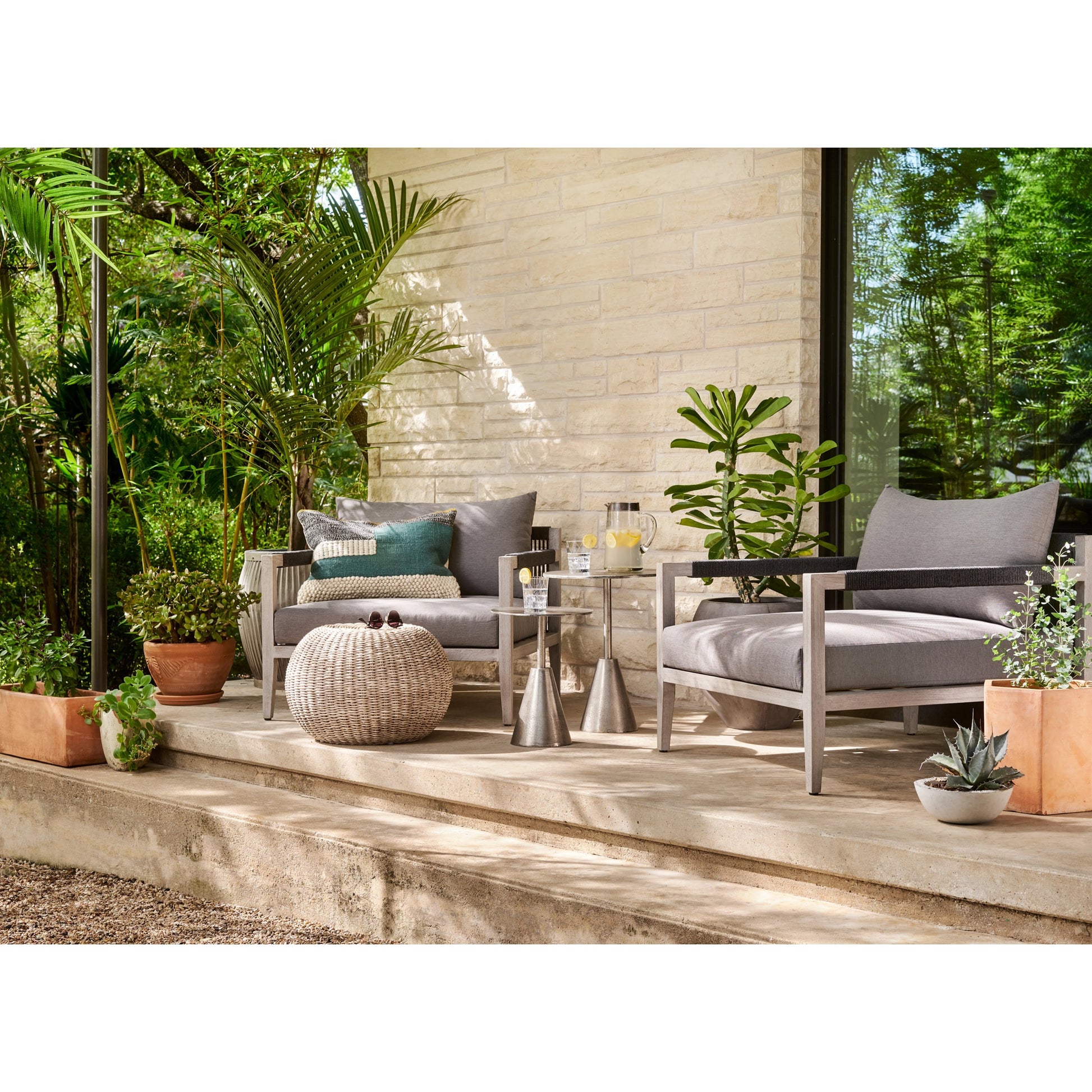 Sherwood Outdoor Chair, Washed Brown by Four Hands. Made from 100% olefin, solid fsc®-certified teak, 100% polypropylene in a coastal style.