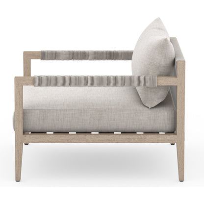 Sherwood Outdoor Chair, Washed Brown by Four Hands. Made from 100% olefin, solid fsc®-certified teak, 100% polypropylene in a coastal style.