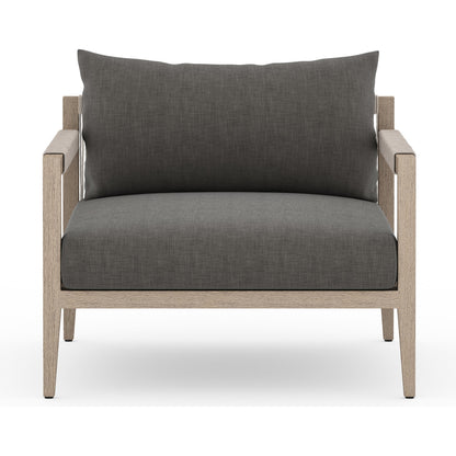 Sherwood Outdoor Chair, Washed Brown by Four Hands. Made from 100% olefin, solid fsc®-certified teak, 100% polypropylene in a coastal style.
