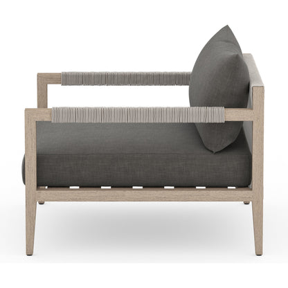 Sherwood Outdoor Chair, Washed Brown by Four Hands. Made from 100% olefin, solid fsc®-certified teak, 100% polypropylene in a coastal style.