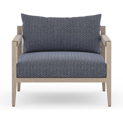 Sherwood Outdoor Chair, Washed Brown by Four Hands. Made from 100% olefin, solid fsc®-certified teak, 100% polypropylene in a coastal style.