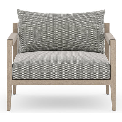 Sherwood Outdoor Chair, Washed Brown by Four Hands. Made from 100% olefin, solid fsc®-certified teak, 100% polypropylene in a coastal style.