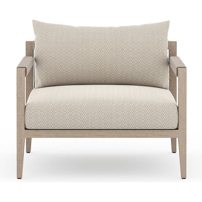 Sherwood Outdoor Chair, Washed Brown by Four Hands. Made from 100% olefin, solid fsc®-certified teak, 100% polypropylene in a coastal style.