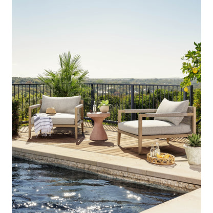 Sherwood Outdoor Chair, Washed Brown by Four Hands. Made from 100% olefin, solid fsc®-certified teak, 100% polypropylene in a coastal style.