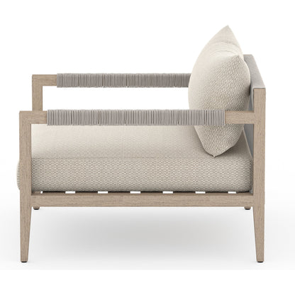 Sherwood Outdoor Chair, Washed Brown by Four Hands. Made from 100% olefin, solid fsc®-certified teak, 100% polypropylene in a coastal style.