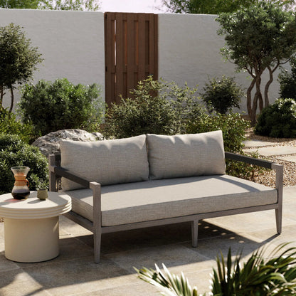 Sherwood Outdoor Sofa, Weathered Grey by Four Hands. Made from 100% olefin, solid fsc®-certified teak, 100% polypropylene in a coastal style.
