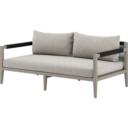Sherwood Outdoor Sofa, Weathered Grey by Four Hands. Made from 100% olefin, solid fsc®-certified teak, 100% polypropylene in a coastal style.