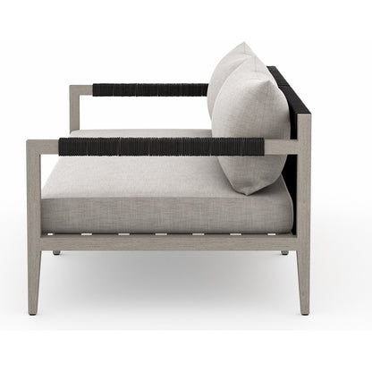 Sherwood Outdoor Sofa, Weathered Grey by Four Hands. Made from 100% olefin, solid fsc®-certified teak, 100% polypropylene in a coastal style.