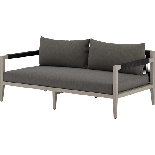 Sherwood Outdoor Sofa, Weathered Grey by Four Hands. Made from 100% olefin, solid fsc®-certified teak, 100% polypropylene in a coastal style.