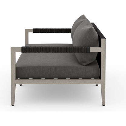 Sherwood Outdoor Sofa, Weathered Grey by Four Hands. Made from 100% olefin, solid fsc®-certified teak, 100% polypropylene in a coastal style.
