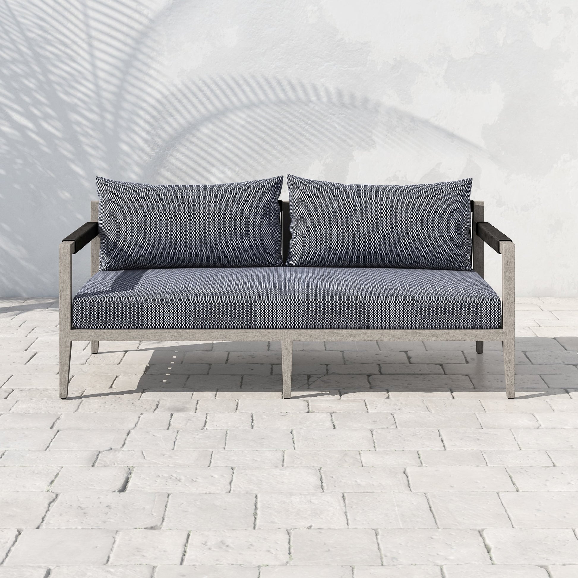 Sherwood Outdoor Sofa, Weathered Grey by Four Hands. Made from 100% olefin, solid fsc®-certified teak, 100% polypropylene in a coastal style.