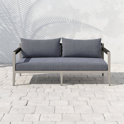 Sherwood Outdoor Sofa, Weathered Grey by Four Hands. Made from 100% olefin, solid fsc®-certified teak, 100% polypropylene in a coastal style.