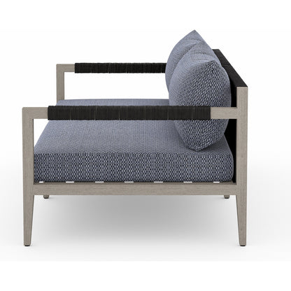 Sherwood Outdoor Sofa, Weathered Grey by Four Hands. Made from 100% olefin, solid fsc®-certified teak, 100% polypropylene in a coastal style.