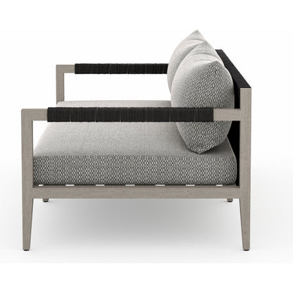 Sherwood Outdoor Sofa, Weathered Grey by Four Hands. Made from 100% olefin, solid fsc®-certified teak, 100% polypropylene in a coastal style.