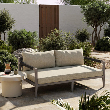 Sherwood Outdoor Sofa, Weathered Grey by Four Hands. Made from 100% olefin, solid fsc®-certified teak, 100% polypropylene in a coastal style.