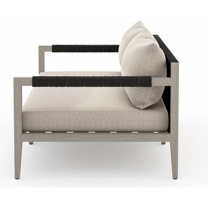 Sherwood Outdoor Sofa, Weathered Grey by Four Hands. Made from 100% olefin, solid fsc®-certified teak, 100% polypropylene in a coastal style.