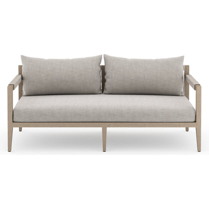Sherwood Outdoor Sofa, Washed Brown by Four Hands. Made from 100% olefin, solid fsc®-certified teak, 100% polypropylene in a coastal style.