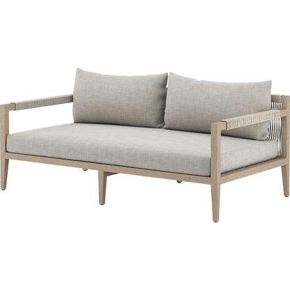 Sherwood Outdoor Sofa, Washed Brown by Four Hands. Made from 100% olefin, solid fsc®-certified teak, 100% polypropylene in a coastal style.