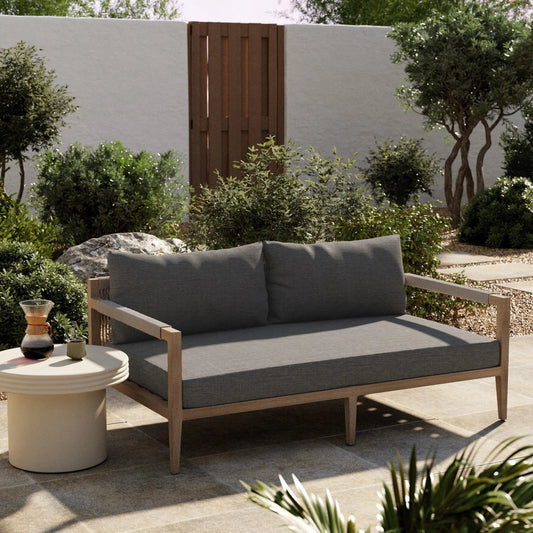 Sherwood Outdoor Sofa, Washed Brown by Four Hands. Made from 100% olefin, solid fsc®-certified teak, 100% polypropylene in a coastal style.