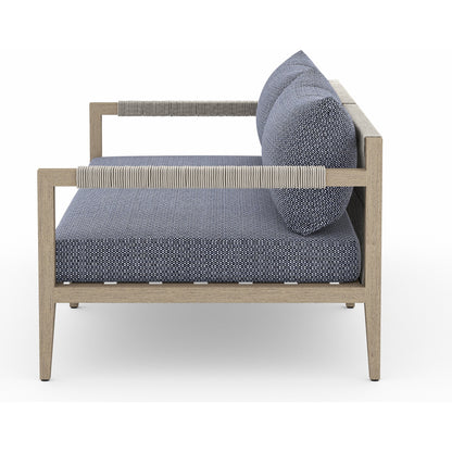 Sherwood Outdoor Sofa, Washed Brown by Four Hands. Made from 100% olefin, solid fsc®-certified teak, 100% polypropylene in a coastal style.