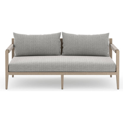 Sherwood Outdoor Sofa, Washed Brown by Four Hands. Made from 100% olefin, solid fsc®-certified teak, 100% polypropylene in a coastal style.