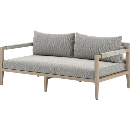 Sherwood Outdoor Sofa, Washed Brown by Four Hands. Made from 100% olefin, solid fsc®-certified teak, 100% polypropylene in a coastal style.