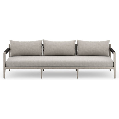 Sherwood Outdoor Sofa, Weathered Grey by Four Hands. Made from 100% olefin, solid fsc®-certified teak, 100% polypropylene in a coastal style.
