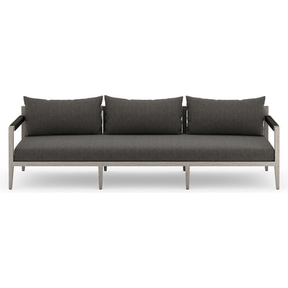 Sherwood Outdoor Sofa, Weathered Grey by Four Hands. Made from 100% olefin, solid fsc®-certified teak, 100% polypropylene in a coastal style.