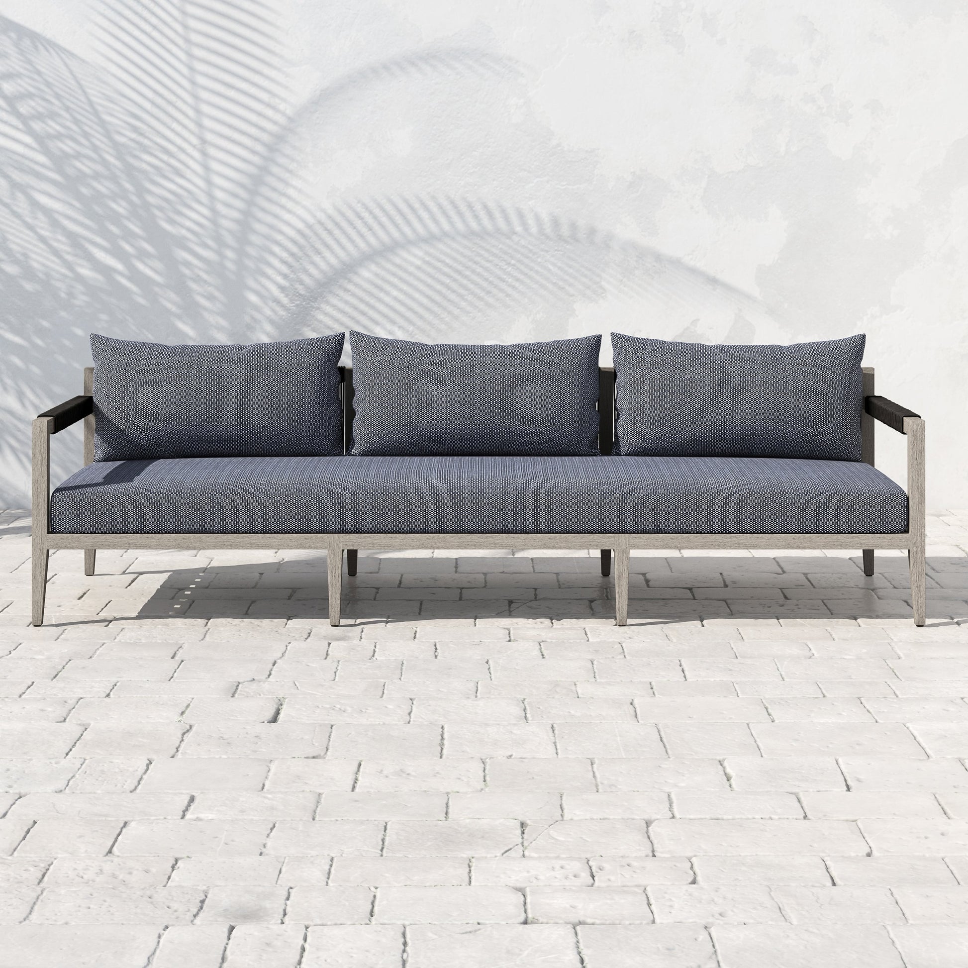 Sherwood Outdoor Sofa, Weathered Grey by Four Hands. Made from 100% olefin, solid fsc®-certified teak, 100% polypropylene in a coastal style.