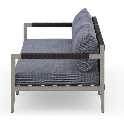 Sherwood Outdoor Sofa, Weathered Grey by Four Hands. Made from 100% olefin, solid fsc®-certified teak, 100% polypropylene in a coastal style.