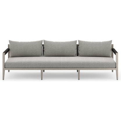 Sherwood Outdoor Sofa, Weathered Grey by Four Hands. Made from 100% olefin, solid fsc®-certified teak, 100% polypropylene in a coastal style.
