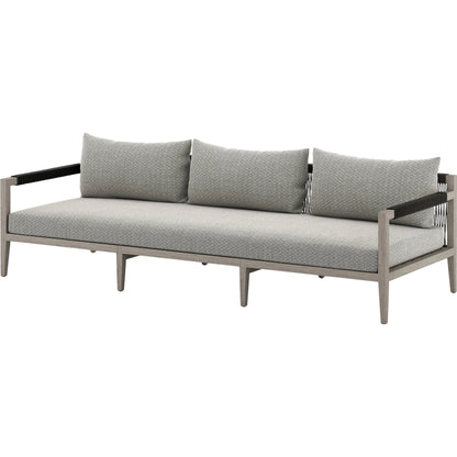 Sherwood Outdoor Sofa, Weathered Grey by Four Hands. Made from 100% olefin, solid fsc®-certified teak, 100% polypropylene in a coastal style.