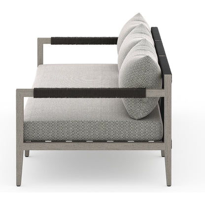 Sherwood Outdoor Sofa, Weathered Grey by Four Hands. Made from 100% olefin, solid fsc®-certified teak, 100% polypropylene in a coastal style.