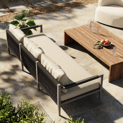 Sherwood Outdoor Sofa, Weathered Grey by Four Hands. Made from 100% olefin, solid fsc®-certified teak, 100% polypropylene in a coastal style.