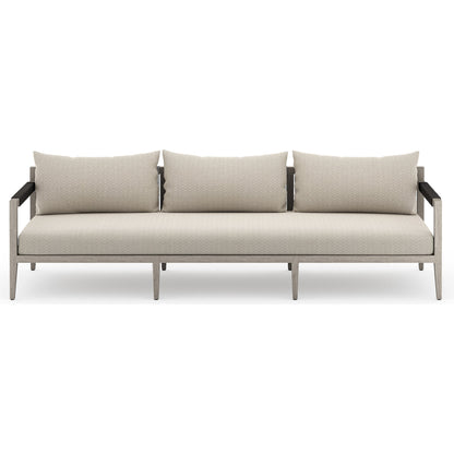 Sherwood Outdoor Sofa, Weathered Grey by Four Hands. Made from 100% olefin, solid fsc®-certified teak, 100% polypropylene in a coastal style.