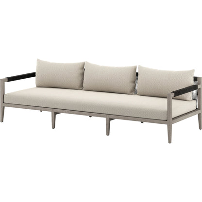 Sherwood Outdoor Sofa, Weathered Grey by Four Hands. Made from 100% olefin, solid fsc®-certified teak, 100% polypropylene in a coastal style.