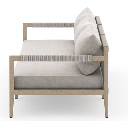 Sherwood Outdoor Sofa, Washed Brown by Four Hands. Made from 100% olefin, solid fsc®-certified teak, 100% polypropylene in a coastal style.