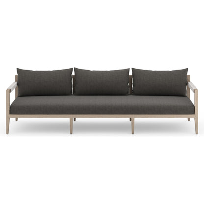 Sherwood Outdoor Sofa, Washed Brown by Four Hands. Made from 100% olefin, solid fsc®-certified teak, 100% polypropylene in a coastal style.