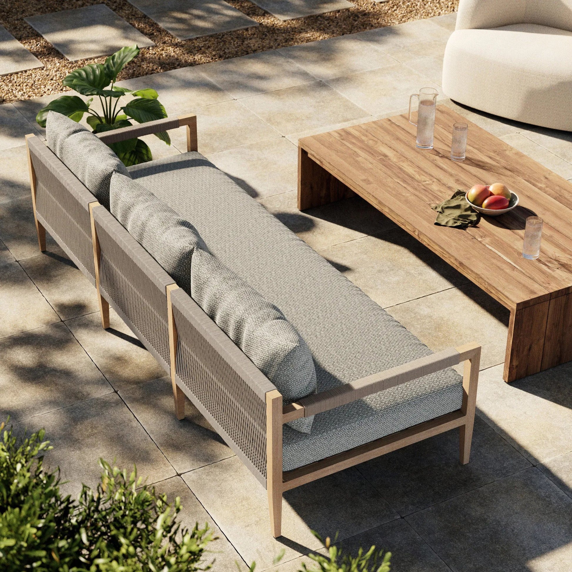 Sherwood Outdoor Sofa, Washed Brown by Four Hands. Made from 100% olefin, solid fsc®-certified teak, 100% polypropylene in a coastal style.