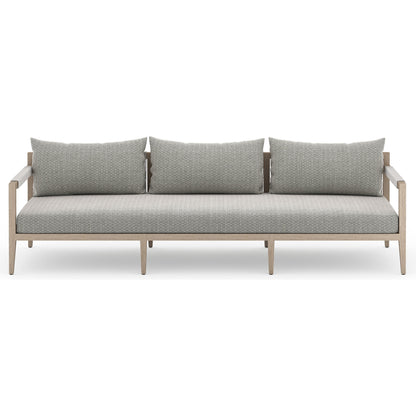 Sherwood Outdoor Sofa, Washed Brown by Four Hands. Made from 100% olefin, solid fsc®-certified teak, 100% polypropylene in a coastal style.