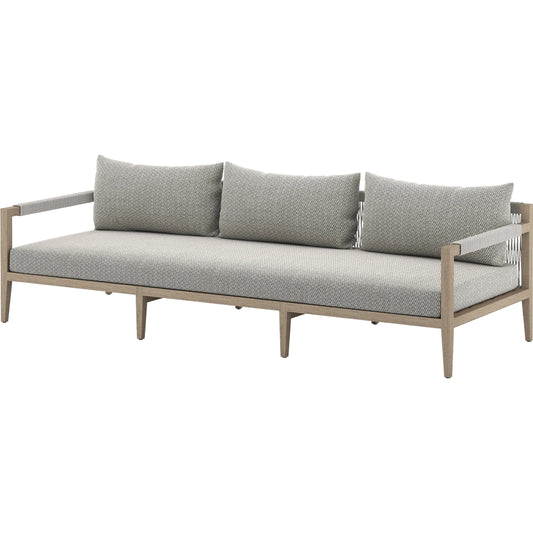 Sherwood Outdoor Sofa, Washed Brown by Four Hands. Made from 100% olefin, solid fsc®-certified teak, 100% polypropylene in a coastal style.