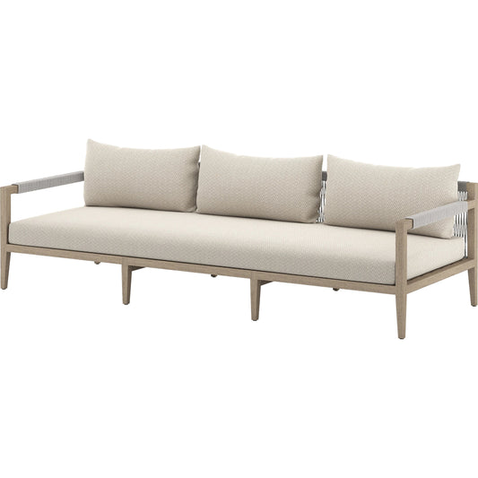 Sherwood Outdoor Sofa, Washed Brown by Four Hands. Made from 100% olefin, solid fsc®-certified teak, 100% polypropylene in a coastal style.