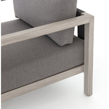 Sonoma Outdoor Chair by Four Hands. Made from 100% olefin, aluminum, 100% polypropylene in a coastal style.