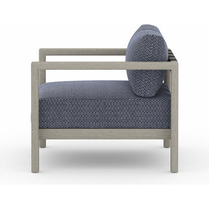 Sonoma Outdoor Chair by Four Hands. Made from 100% olefin, aluminum, 100% polypropylene in a coastal style.