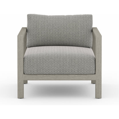 Sonoma Outdoor Chair by Four Hands. Made from 100% olefin, aluminum, 100% polypropylene in a coastal style.