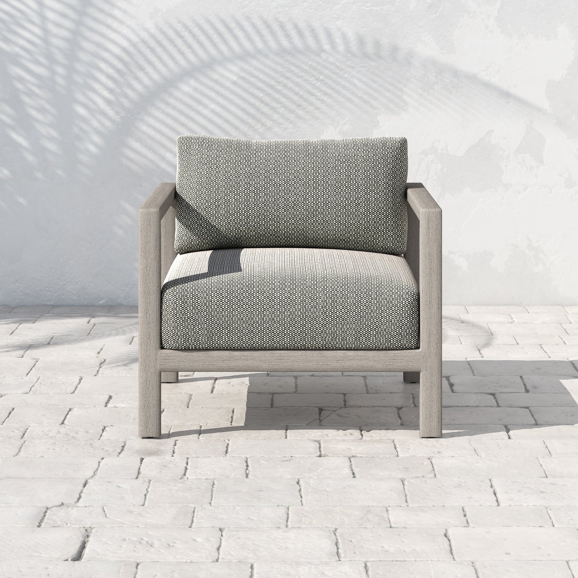 Sonoma Outdoor Chair by Four Hands. Made from 100% olefin, aluminum, 100% polypropylene in a coastal style.
