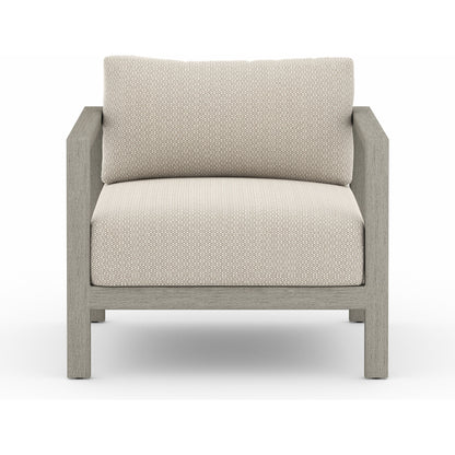 Sonoma Outdoor Chair by Four Hands. Made from 100% olefin, aluminum, 100% polypropylene in a coastal style.