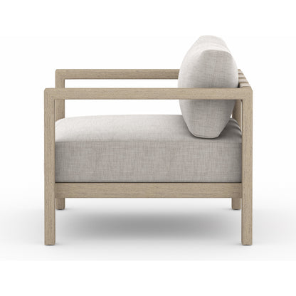 Sonoma Outdoor Chair by Four Hands. Made from 100% olefin, aluminum, 100% polypropylene in a coastal style.