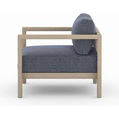 Sonoma Outdoor Chair by Four Hands. Made from 100% olefin, aluminum, 100% polypropylene in a coastal style.